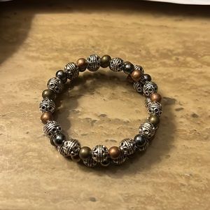 A handmade one of a kind metal bead bracelet